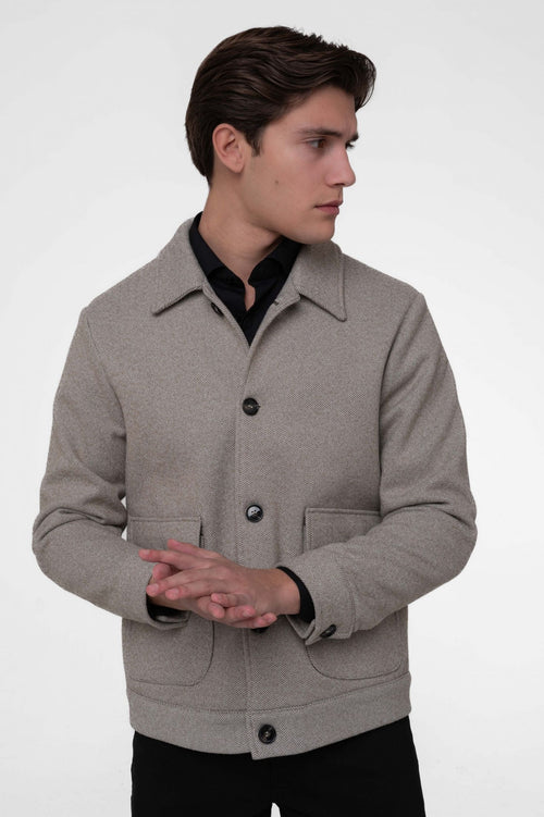 Giubbotto modello polo in tweed spigato