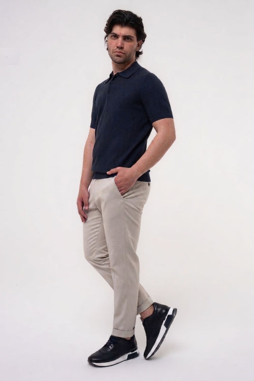 Pantaloni chinio micro fantasia con risvolto