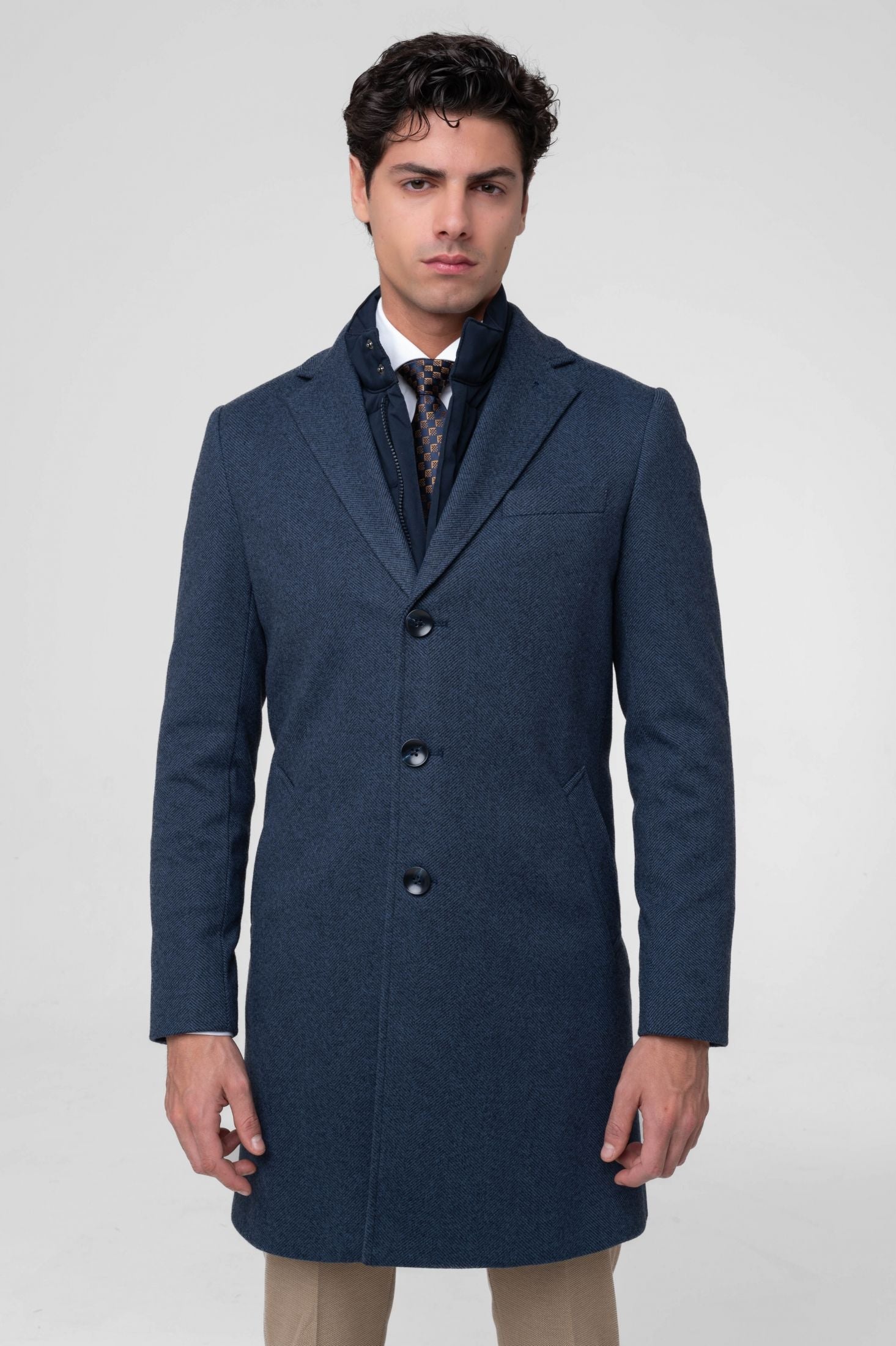 Cappotto spigato con pettorina