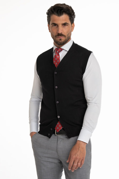 Cardigan smanicato in fine maglia